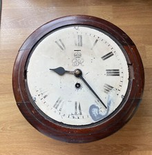 F W ELLIOTT CLOCK (8" DIAL)