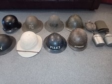 WW2 army helmet and water