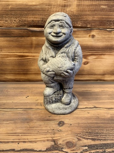 Stone garden fisherman fish - stone,