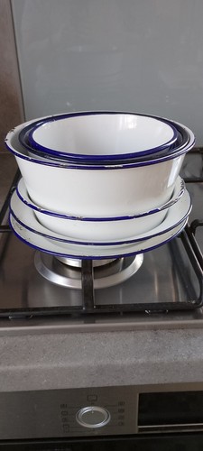 Seven vintage enamel bowls - seven,