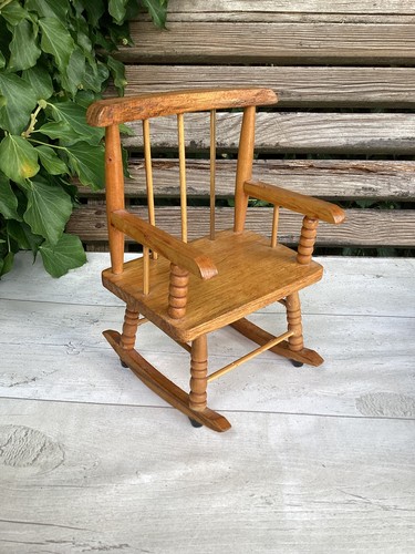 One wooden rocking chair - one, for