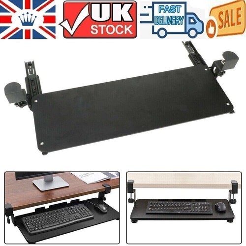 Keyboard tray under desk with - keyboard,