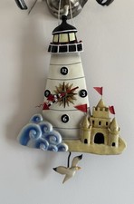 Vintage Allen Designs lighthouse pendulum clock.
