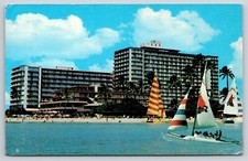 Reef Hotel Waikiki Beach Scene HI 1985 Postcard Hotels Sunbathers Catamaran Boat