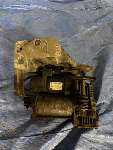 Air suspension compressor with - suspension,