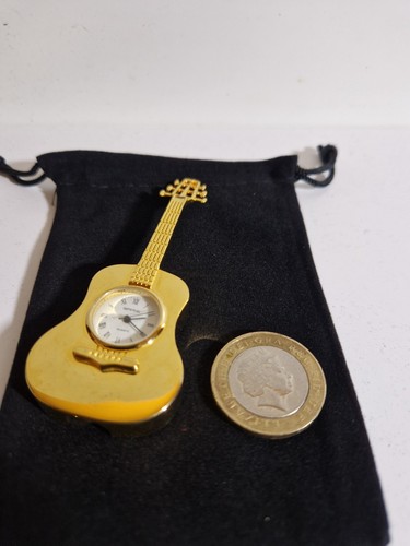 Miniature quartz brass bass - brass,