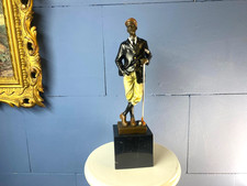 Bronze sculpture golfer