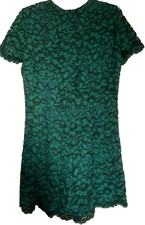 A Ladies Green Lace Jumpsuit