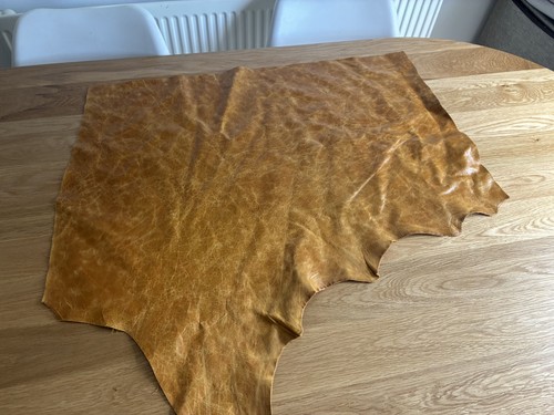 Distressed tan leather cowhide - distressed,