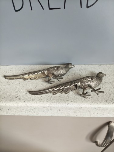 Pair silver tone - of,