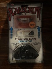 Scarecrow Retractable Fangs