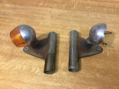 Suzuki gt125 headlight ears - headlight,