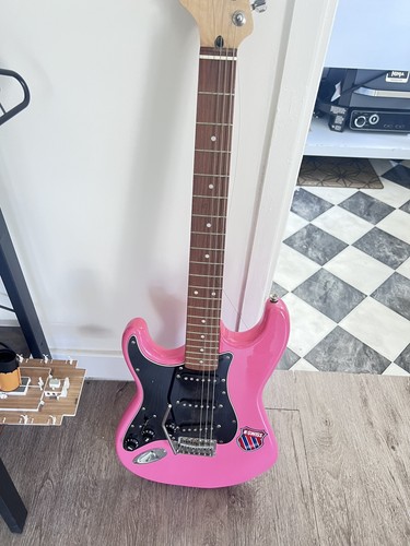 Pink electric guitar - electric,