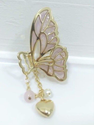 Pink butterfly hair clip with