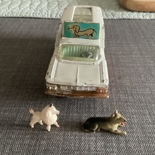 Corgi 486 Chevrolet Impala Kennel Club Vehicle with two original dogs.