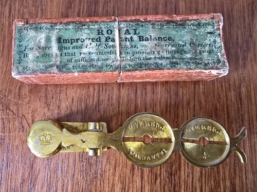 Antique brass sovereign coin - antique,