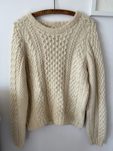 Hand knitted aran wool cream - hand,