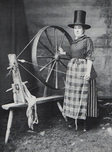 Welsh woman standing beside - , a