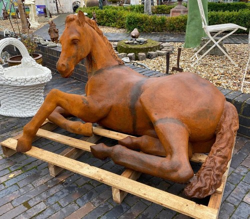 Lifesize cast iron laying foal - iron,