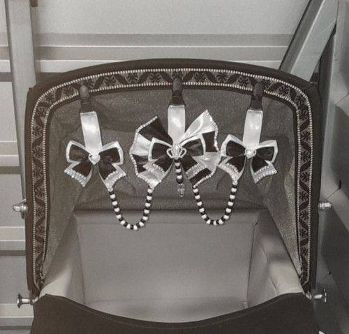Black and white triple pram