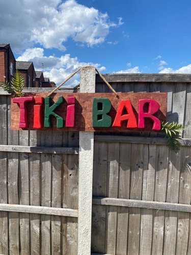 Handmade wooden tiki bar sign
