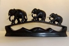 Vintage Carved Ebony Elephant Group : Wooden with inlaid eyes etc. .