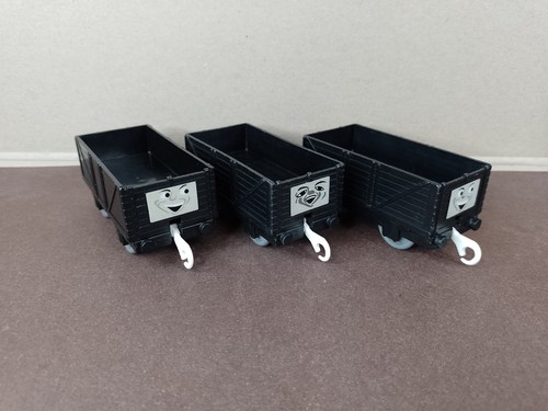 Three black troublesome trucks - three,