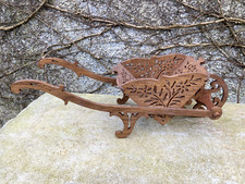Vintage hand carved wooden wheel barrow, 42 cm long and 14 cm wide.