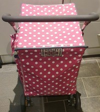 The Petticoat Sholley  shopping cart with pink and white polka-dot design.
