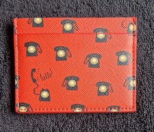 ANTHROPOLOGIE ORANGE ROTARY