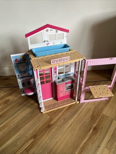 Barbie story dolls house - dolls,
