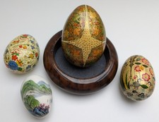 4 Hand Painted Egg Shaped Items Inc Wood, Stone & Papier Mache And A Wooden Dish