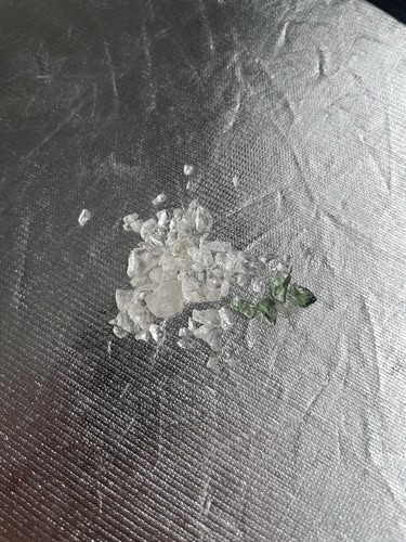 Phenacite and moldavite - phenacite, chips