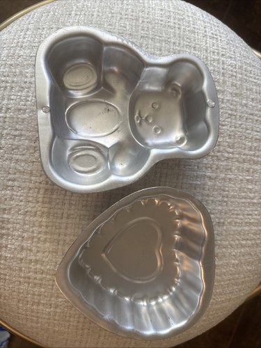 Teddy bear and heart metal - and,