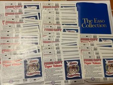 50 Vintage Esso Tiger Tokens With Blue Collectors Wallet. Various Conditions