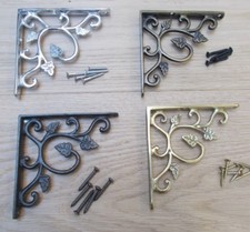 PAIR OF SMALL LEAF BRACKETS