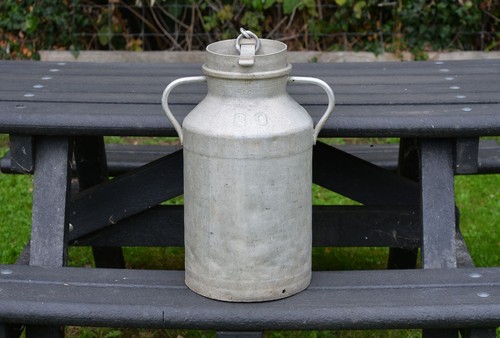 Vintage old aluminium milk