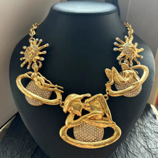 Schiaparelli Fashion Charm Exquisite Gold Tone Body Art Planet Necklace