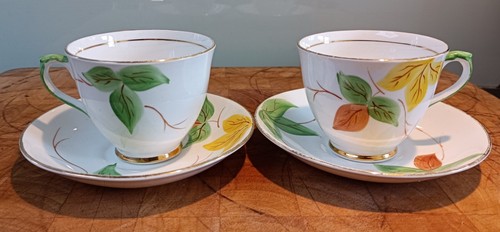 Vintage cup saucers - &,