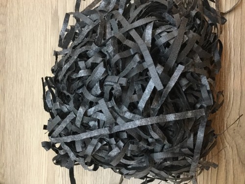 Black shredded paper various - shredded,