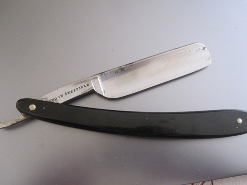 Vintage bakelite cut throat - ,