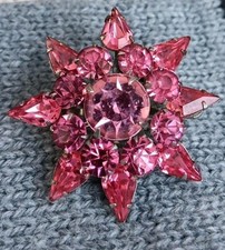 Coro Signed, tiered starburst