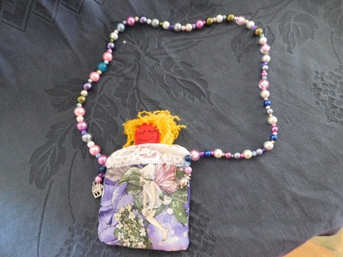 Voodoo doll necklace pouch - doll, in
