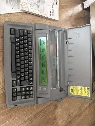 Sharp 560 personal word - fw-560,
