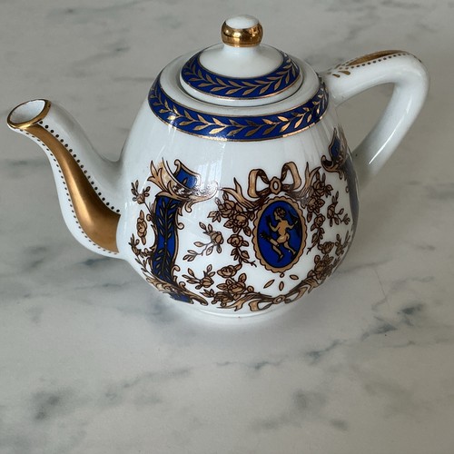 Porcelain art miniature teapot - art,
