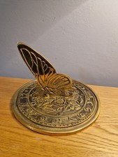 Brass butterfly sundial, a