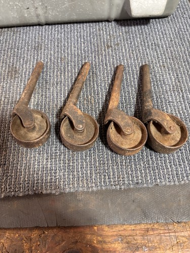 Antique cast iron castor - antique,