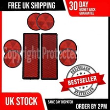 EIGHT RED REFLECTORS