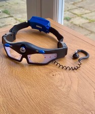 Toy spy glasses with earpiece