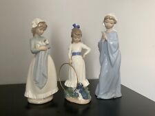 Nao x 3 - Girl holding puppy, nun, girl hoop & dog